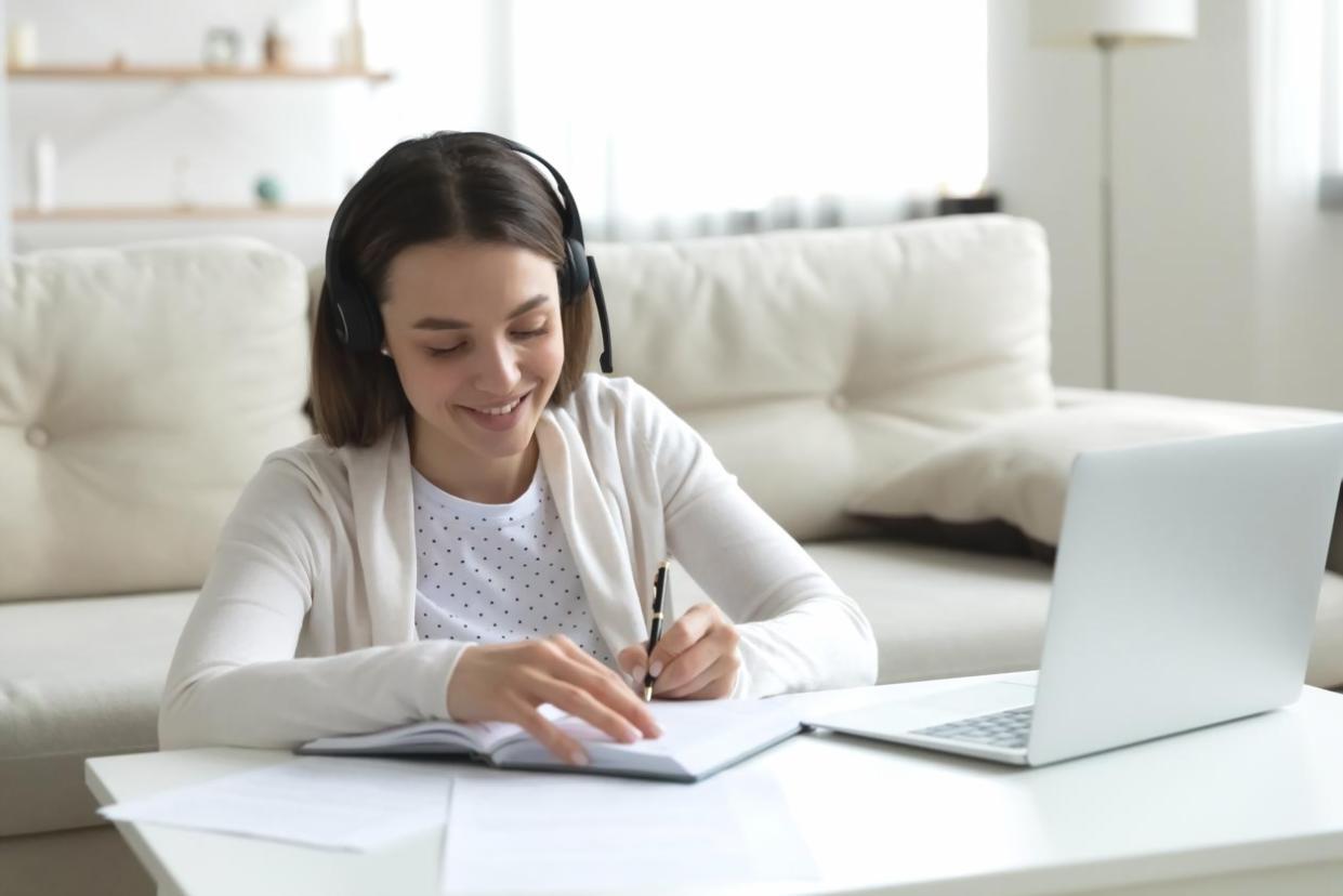 Consultant reviewing financial workflow documentation with a client team